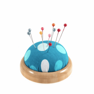Pin Cushion on a wooden base